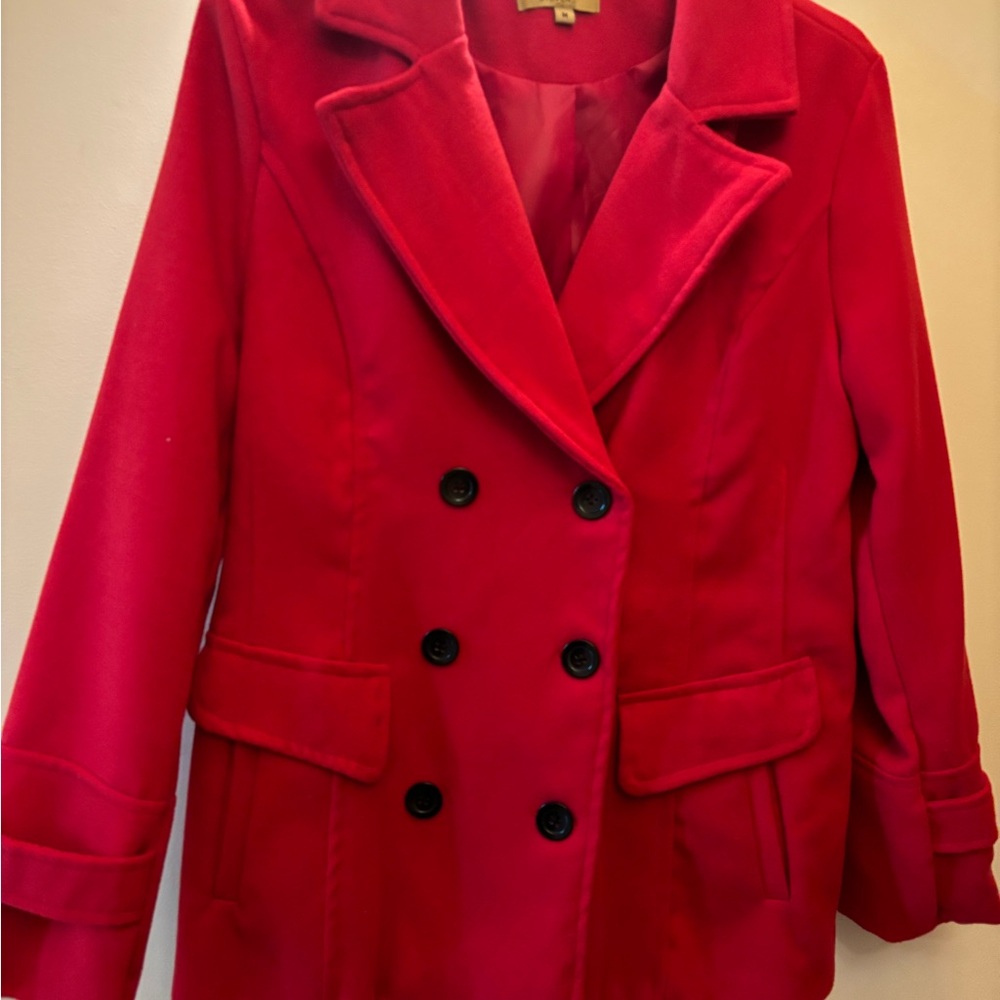 Valerie Steven’s women’s red winter coat with black button detail in size M.